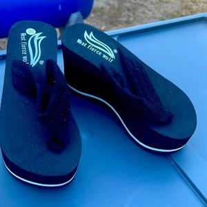 Black slipper platform.